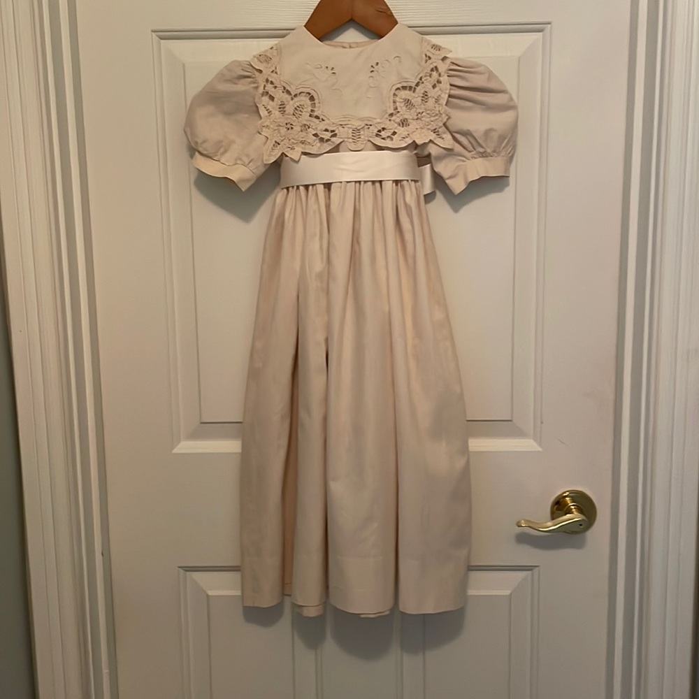 Gorgeous beige girls dress with beautiful lace and embroidery.Satin ribbon sash